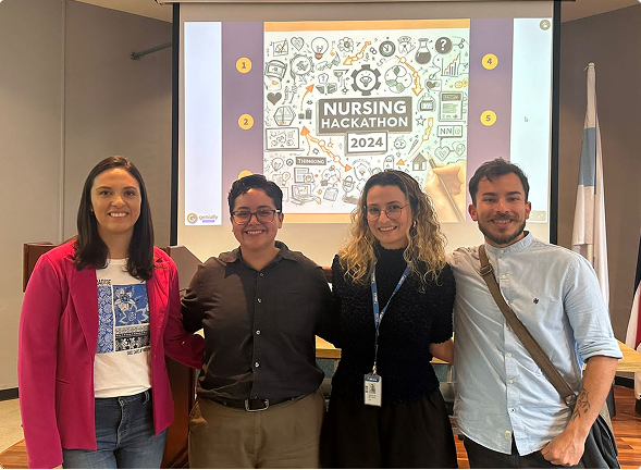 Emilio among the organizer and other consultants in a Nursing student hackathon